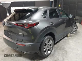 2021 Mazda CX-30 Preferred with VIN 3MVDMBCL1MM247701, listed as a IAAI auction lot 42299009 with 15,880 mi miles and . Bid and sale history available at DreamBid. Image 4.