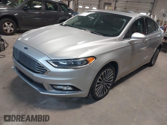 2018 Ford Fusion Titanium with VIN 3FA6P0D91JR138698, listed as a IAAI auction lot 41992522 with 95,017 mi miles and . Bid and sale history available at DreamBid. Image 2.