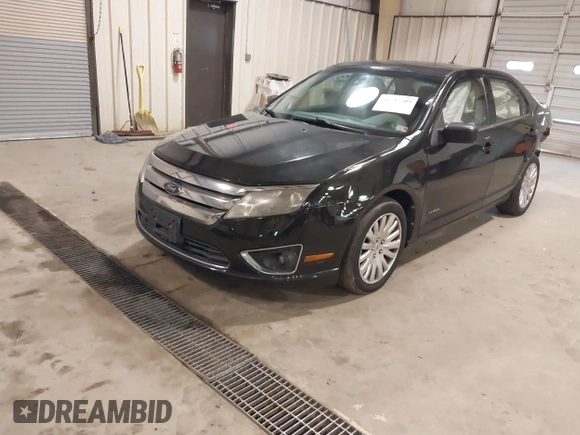 2010 Ford Fusion Hybrid with VIN 3FADP0L39AR140087, listed as a IAAI auction lot 41737705 with 118,563 mi miles. Bid and sale history available at carsss.com. Image 2.
