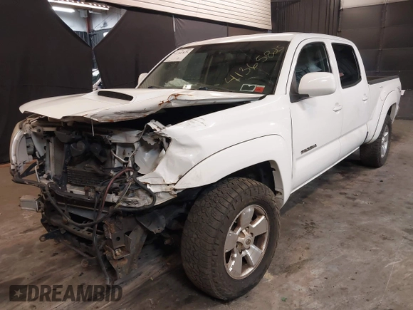 2009 Toyota Tacoma with VIN 5TEMU52N89Z620734, listed as a IAAI auction lot 41365825 with 336,070 mi miles and . Bid and sale history available at DreamBid. Image 2.