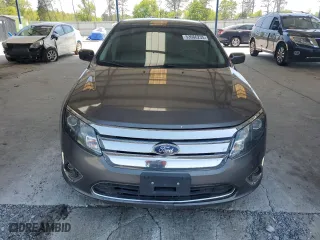 2011 Ford Fusion Hybrid with VIN 3FADP0L35BR180930, listed as a Copart auction lot 53066235 with 156,548 mi miles and Clean Title. Bid and sale history available at carsss.com. Image 5.