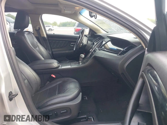 2011 Ford Taurus Limited z VIN 1FAHP2FW9BG118585, wystawiony jako IAAI lot #42124229 z przebiegiem 182 096 mil mil oraz . Historia ofert i sprzedaży dostępna na DreamBid. Obrazek 5.
