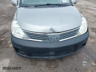 2009 Nissan Versa 1.8 S with VIN 3N1BC11E29L363158, listed as a IAAI auction lot 42070151 with 168,349 mi miles. Bid and sale history available at carsss.com. Image 6.