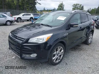 2014 Ford Escape Titanium with VIN 1FMCU9J95EUD60587, listed as a IAAI auction lot 42129854 with 155,559 mi miles and . Bid and sale history available at DreamBid. Image 17.