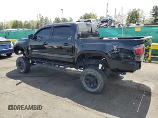 2019 Toyota Tacoma SR z VIN 3TMCZ5AN1KM253032, wystawiony jako Copart lot #52598445 z przebiegiem 69 489 mil mil oraz Szkoda całkowita • Salvage title. Historia ofert i sprzedaży dostępna na DreamBid. Obrazek 2.
