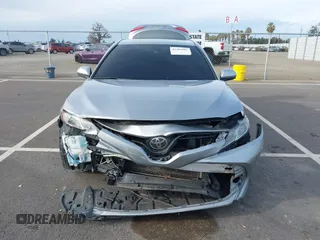 2019 Toyota Camry LE with VIN 4T1B11HK7KU803624, listed as a IAAI auction lot 41589107 with 169,863 mi miles and . Bid and sale history available at DreamBid. Image 12.