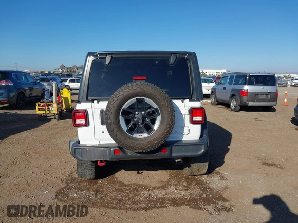2019 Jeep Wrangler Unlimited Rubicon with VIN 1C4HJXFN7KW505383, listed as a IAAI auction lot 41220907 with 53,578 mi miles and . Bid and sale history available at DreamBid. Image 16.
