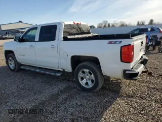 2017 Chevrolet Silverado 1500 LT with VIN 3GCUKREC7HG170799, listed as a Copart auction lot 51337575 with 115,851 mi miles and Salvage Title. Bid and sale history available at DreamBid. Image 2.