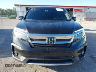 2021 Honda Pilot EX-L with VIN 5FNYF5H55MB044677, listed as a IAAI auction lot 42038704 with 38,684 mi miles and . Bid and sale history available at carsss.com. Image 13.