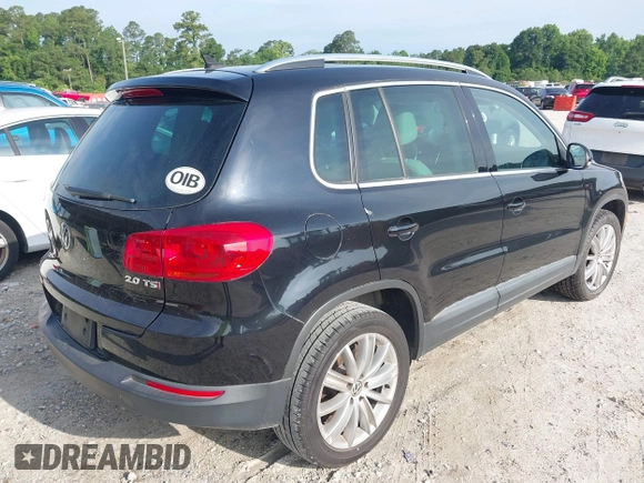 2012 Volkswagen Tiguan SE z VIN WVGAV7AX7CW535575, wystawiony jako IAAI lot #42351369 z przebiegiem 93 501 mil mil oraz . Historia ofert i sprzedaży dostępna na DreamBid. Obrazek 4.