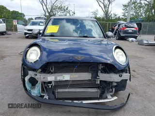 2017 MINI Hardtop 4 Door Cooper with VIN WMWXU1C54H2E19114, listed as a IAAI auction lot 42107266 with 83,524 mi miles and . Bid and sale history available at DreamBid. Image 13.