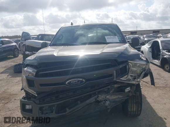 2020 Ford F-150 XL z VIN 1FTEW1CP0LKF02003, wystawiony jako IAAI lot #42431211 z przebiegiem 94 023 mil mil oraz . Historia ofert i sprzedaży dostępna na DreamBid. Obrazek 13.