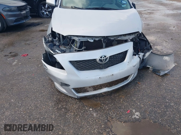 2010 Toyota Corolla with VIN 2T1BU4EE9AC502425, listed as a IAAI auction lot 42085262 with 120,148 mi miles and . Bid and sale history available at DreamBid. Image 12.
