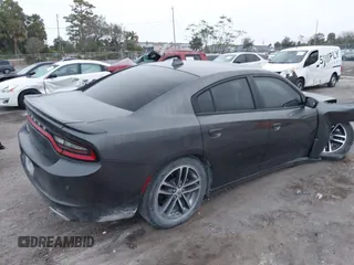 2019 Dodge Charger SXT with VIN 2C3CDXJG1KH730489, listed as a IAAI auction lot 41189171 with 39,514 mi miles and . Bid and sale history available at DreamBid. Image 4.