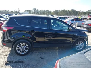 2017 Ford Escape SE with VIN 1FMCU0GD6HUE12367, listed as a IAAI auction lot 41899960 with 121,871 mi miles and . Bid and sale history available at DreamBid. Image 13.