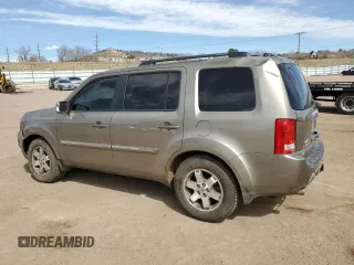 2011 Honda Pilot Touring with VIN 5FNYF4H92BB046932, listed as a Copart auction lot 49811465 with 176,295 mi miles and Salvage Title. Bid and sale history available at carsss.com. Image 2.
