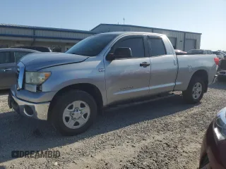 2010 Toyota Tundra with VIN 5TFUM5F17AX007037, listed as a Copart auction lot 61911715 with 174,049 mi miles and Salvage title. Bid and sale history available at DreamBid. Image 1.