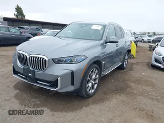 2024 BMW X5 xDrive40i with VIN 5UX23EU08R9U20717, listed as a IAAI auction lot 42392632 with 42,085 mi miles and . Bid and sale history available at DreamBid. Image 2.