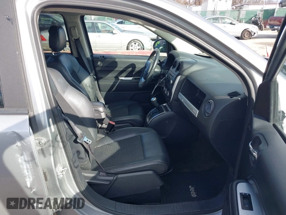 2016 Jeep Compass Latitude with VIN 1C4NJDEB5GD713905, listed as a IAAI auction lot 41138023 with 107,479 mi miles and . Bid and sale history available at DreamBid. Image 5.