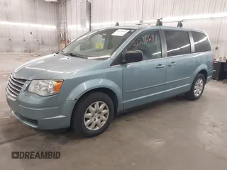2010 Chrysler Town & Country LX with VIN 2A4RR4DE1AR285996, listed as a IAAI auction lot 42236641 with 165,772 mi miles and . Bid and sale history available at DreamBid. Image 2.