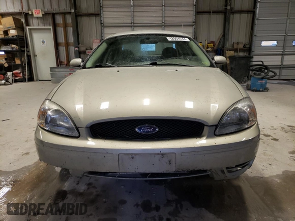 2004 Ford Taurus SE with VIN 1FAFP53U74G122231, listed as a Copart auction lot 42904044 with 116,851 mi miles and Salvage Title. Bid and sale history available at DreamBid. Image 5.