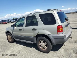 2004 Ford Escape XLT with VIN 1FMYU03104KA53587, listed as a Copart auction lot 51777385 with 154,102 mi miles and Salvage Title. Bid and sale history available at carsss.com. Image 2.
