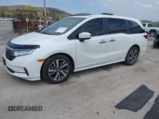 2021 Honda Odyssey Touring with VIN 5FNRL6H80MB010952, listed as a IAAI auction lot 42080412 with 90,594 mi miles and . Bid and sale history available at DreamBid. Image 17.