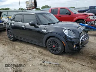 2019 MINI Hardtop 4 Door Cooper S с VIN WMWXU3C58K2H87220, выставлен на аукционе Copart как лот 55775665 с пробегом 54 404 миль миль и Списание • Salvage title. История ставок и продаж доступна на DreamBid. Изображение 4.