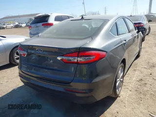 2020 Ford Fusion SE with VIN 3FA6P0H74LR207234, listed as a IAAI auction lot 41764169 with 94,518 mi miles. Bid and sale history available at carsss.com. Image 4.