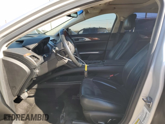 2015 Lincoln MKZ z VIN 3LN6L2G9XFR610736, wystawiony jako Copart lot #80662274 z przebiegiem 101 441 mil mil oraz Szkoda całkowita • Salvage title. Historia ofert i sprzedaży dostępna na DreamBid. Obrazek 7.