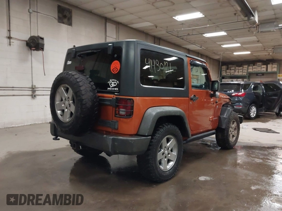 2011 Jeep Wrangler Rubicon with VIN 1J4BA6D15BL624268, listed as a IAAI auction lot 41430121 with 142,433 mi miles and . Bid and sale history available at carsss.com. Image 4.