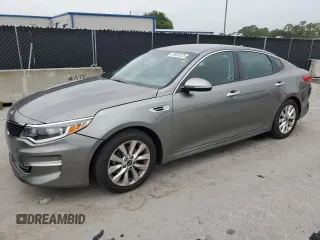 2017 Kia Optima LX z VIN 5XXGT4L34HG165031, wystawiony jako Copart lot #59993375 z przebiegiem 115 671 mil mil oraz Czysty tytuł • Clean title. Historia ofert i sprzedaży dostępna na DreamBid. Obrazek 1.