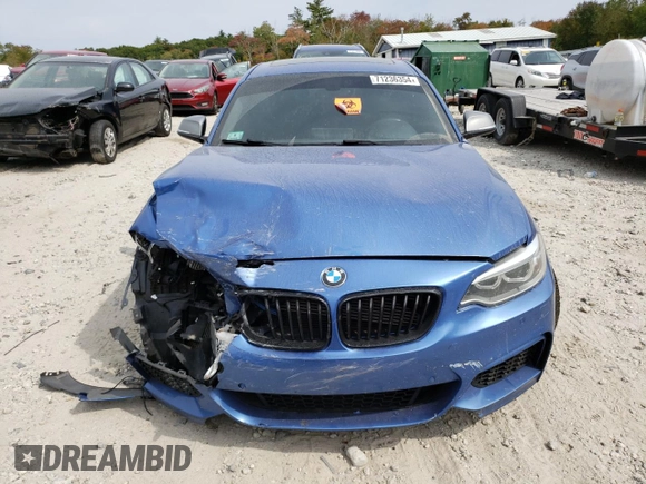 2016 BMW 2 Series M235i xDrive with VIN WBA1J9C52GV372057, listed as a Copart auction lot 71236354 with 89,420 mi miles and Salvage Title. Bid and sale history available at carsss.com. Image 5.
