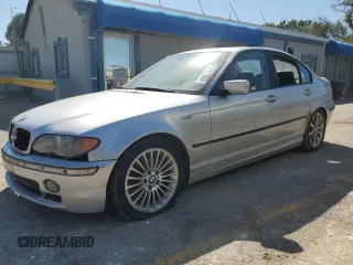 2003 BMW 3 Series 330xi with VIN WBAEW53413PG09450, listed as a Copart auction lot 74111954 with 252,295 mi miles and Salvage Title. Bid and sale history available at carsss.com. Image 1.