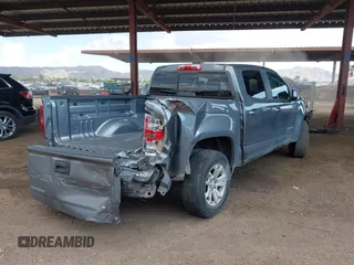 2021 Chevrolet Colorado 4WD LT with VIN 1GCGTCEN1M1107053, listed as a IAAI auction lot 42430796 with 76,128 mi miles and . Bid and sale history available at DreamBid. Image 4.