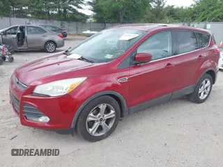 2014 Ford Escape SE z VIN 1FMCU0GX3EUC64328, wystawiony jako IAAI lot #42182502 z przebiegiem 135 496 mil mil oraz . Historia ofert i sprzedaży dostępna na DreamBid. Obrazek 2.