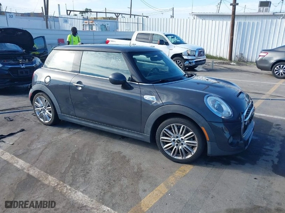 2015 MINI Cooper Hardtop S with VIN WMWXP7C59F2A60317, listed as a IAAI auction lot 41703020 with NaN miles. Bid and sale history available at carsss.com. Image 1.