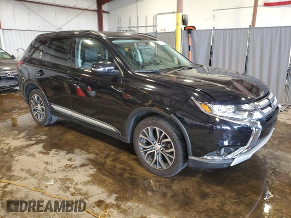 2016 Mitsubishi Outlander SE with VIN JA4AD3A36GZ008543, listed as a Copart auction lot 64110315 with 190,865 mi miles and Salvage title. Bid and sale history available at DreamBid. Image 4.