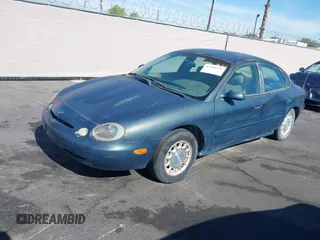1996 Ford Taurus LX with VIN 1FALP53S0TG125665, listed as a IAAI auction lot 42290691 with 91,152 mi miles and . Bid and sale history available at DreamBid. Image 2.