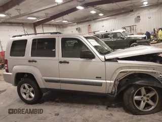 2009 Jeep Liberty Sport with VIN 1J8GN28K09W552232, listed as a IAAI auction lot 41306465 with 158,293 mi miles and . Bid and sale history available at DreamBid. Image 13.