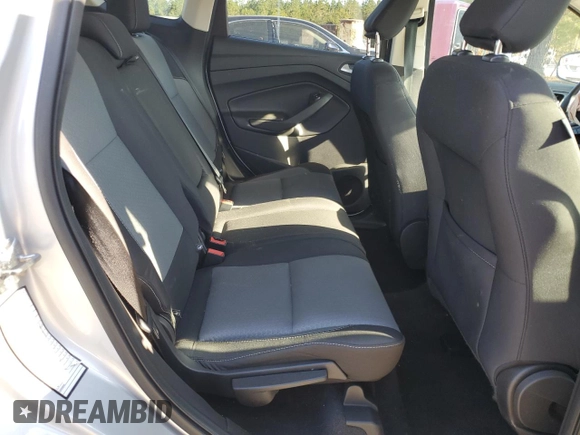 2018 Ford Escape SE z VIN 1FMCU9G96JUB49271, wystawiony jako Copart lot #50553205 z przebiegiem 91 123 mil mil oraz Szkoda całkowita • Salvage title. Historia ofert i sprzedaży dostępna na DreamBid. Obrazek 11.