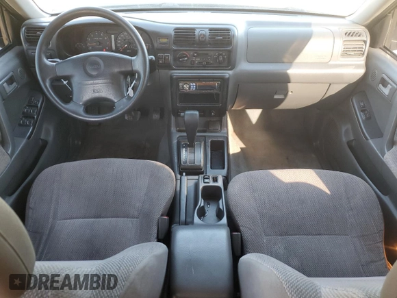 1999 Isuzu Rodeo S with VIN 4S2CK58W2X4336401, listed as a Copart auction lot 83872484 with 191,278 mi miles and Salvage title. Bid and sale history available at DreamBid. Image 8.