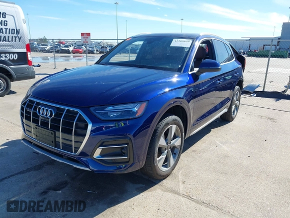 2023 Audi Q5 Premium Plus with VIN WA1BBAFYXP2195975, listed as a IAAI auction lot 41309879 with 11,124 mi miles and . Bid and sale history available at DreamBid. Image 18.