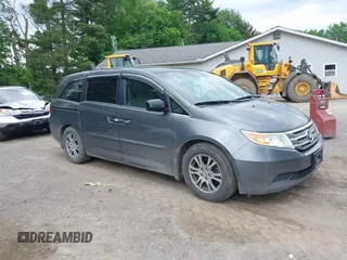 2012 Honda Odyssey EX z VIN 5FNRL5H45CB084342, wystawiony jako IAAI lot #42329303 z przebiegiem 173 711 mil mil oraz . Historia ofert i sprzedaży dostępna na DreamBid. Obrazek 1.