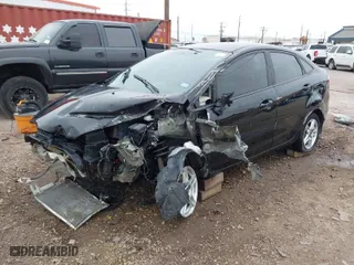 2017 Ford Fiesta SE with VIN 3FADP4BJ7HM137543, listed as a IAAI auction lot 41555369 with 141,780 mi miles. Bid and sale history available at carsss.com. Image 2.