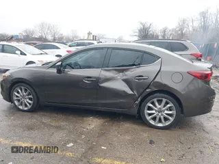 2014 Mazda 3 S Touring with VIN JM1BM1V31E1111499, listed as a IAAI auction lot 41476457 with 109,337 mi miles and . Bid and sale history available at DreamBid. Image 14.