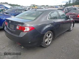 2009 Acura TSX with VIN JH4CU266X9C007198, listed as a IAAI auction lot 42535076 with 168,409 mi miles and . Bid and sale history available at DreamBid. Image 4.