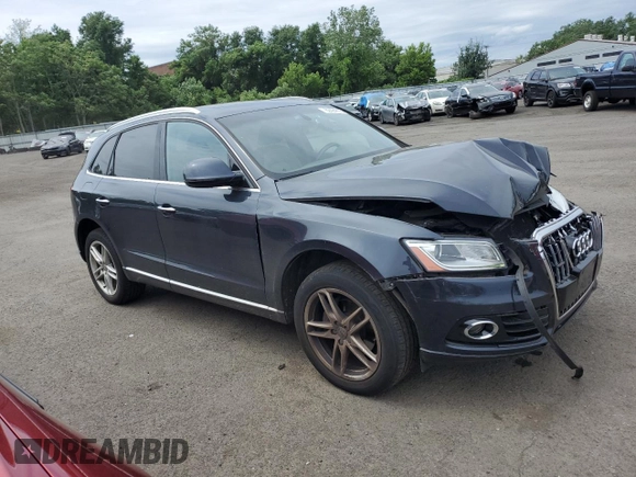 2017 Audi Q5 Premium Plus with VIN WA1L2AFP4HA015618, listed as a Copart auction lot 62494185 with 88,751 mi miles and Salvage title. Bid and sale history available at DreamBid. Image 4.