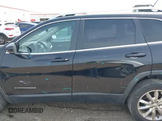 2014 Jeep Cherokee Limited with VIN 1C4PJLDB4EW256137, listed as a IAAI auction lot 42236043 with 145,517 mi miles and . Bid and sale history available at DreamBid. Image 15.