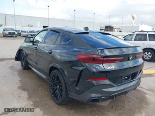 2022 BMW X6 xDrive40i with VIN 5UXCY6C01N9K61756, listed as a IAAI auction lot 41083429 with 53,132 mi miles. Bid and sale history available at carsss.com. Image 3.